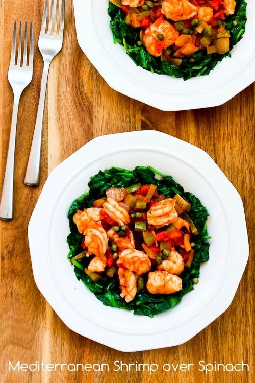 Mediterranean shrimp over spinach 