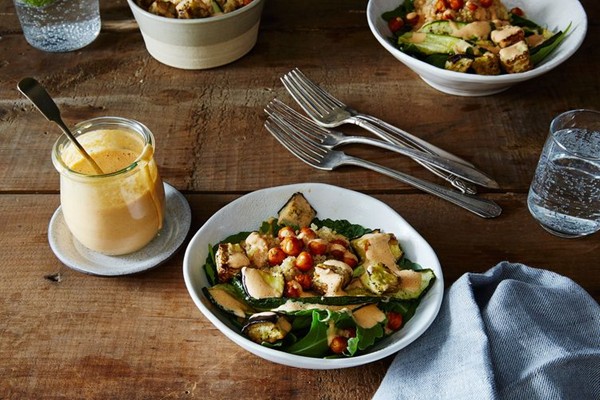Mediterranean vegetable bowls with quinoa, toasted chickpeas, and harissa tahini