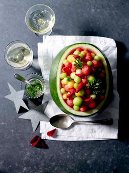 Melon balls with rose gernaium leaves