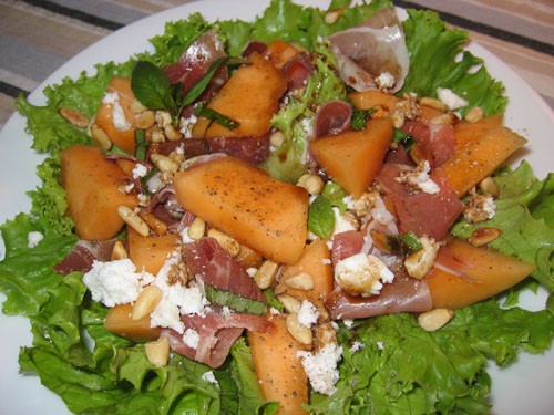 Melon salad with prosciutto and goats cheese