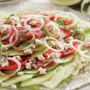 Melon, tomato & onion salad with goat cheese