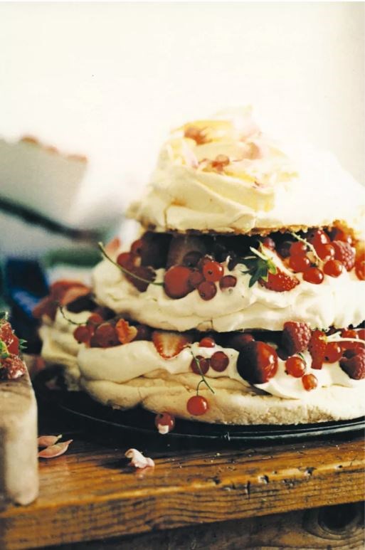 Meringue and rose cake with summer berries