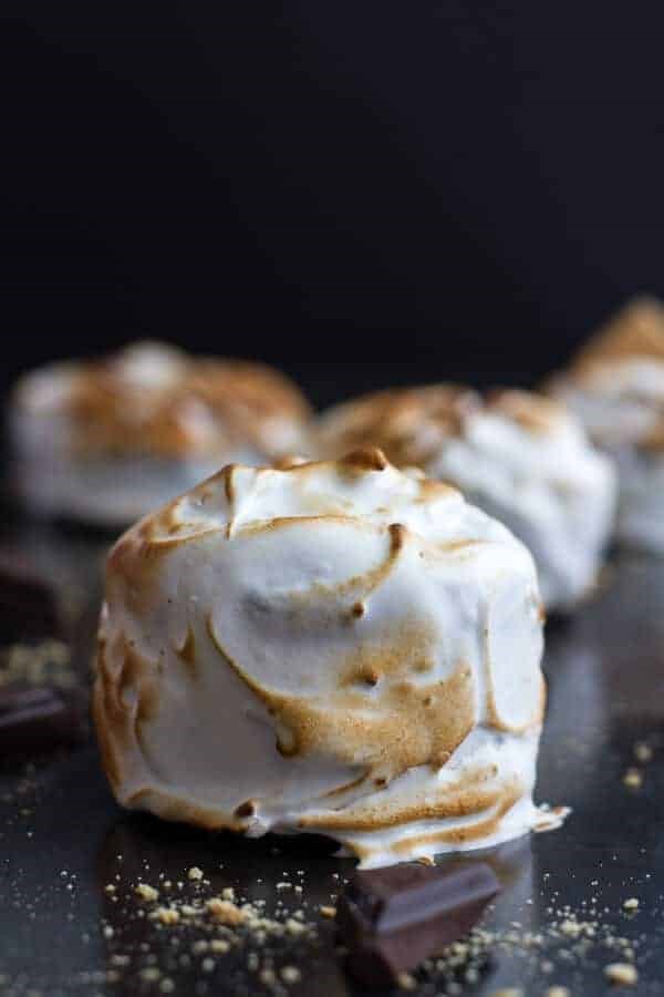 Meringue encased chocolate mousse s’more cakes
