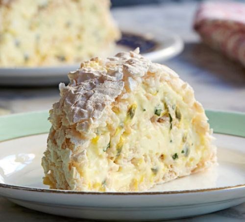 Meringue roulade with passion fruit cream