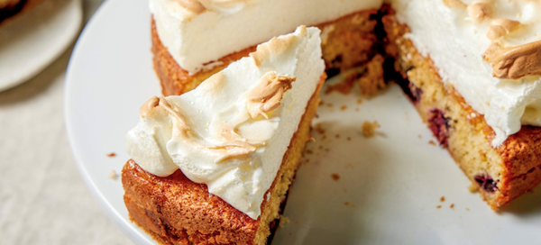 Meringue-topped cake with cherries
