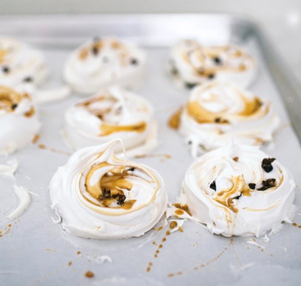 Meringues with cacao nibs and caramel swirl