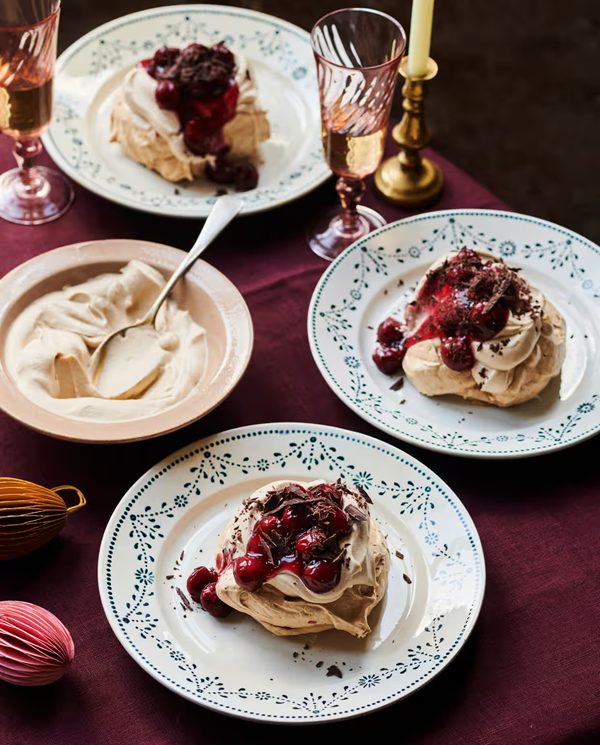 Meringues with coffee cream and cherries