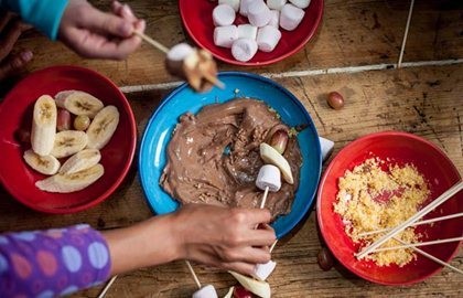 Messy chocolate fondue with marshmallow and banana dunkers