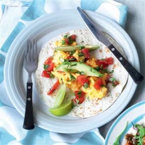 Mexican breakfast with flour tortillas and avocado