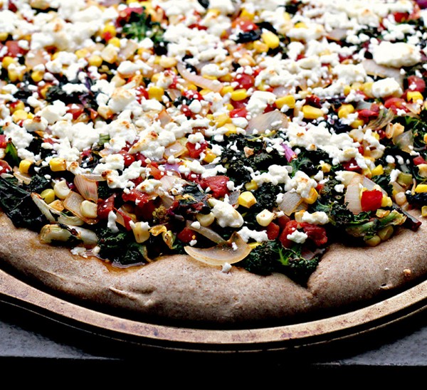 Mexican pizza with kale, queso and a chipotle tomato sauce