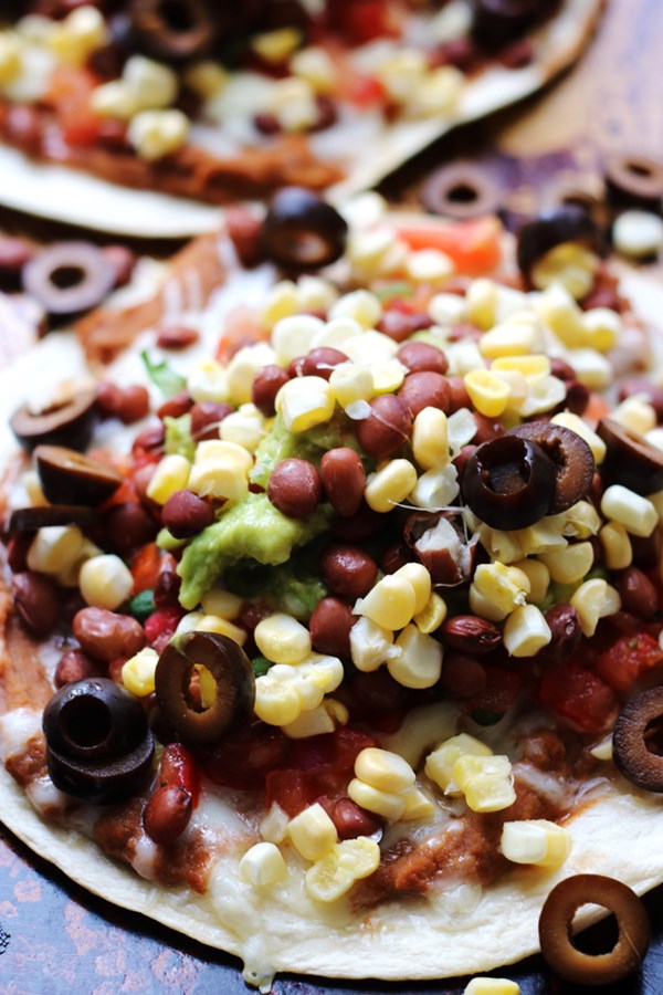Mexican seven layer dip tostadas