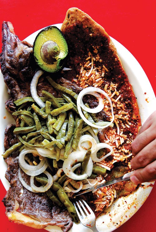 Mexico City-style corn tortillas with steak (Huarache con carne asada)