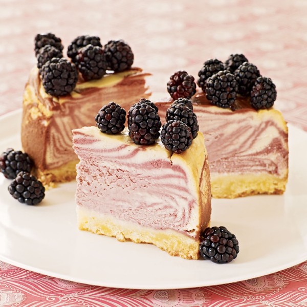Meyer lemon and blackberry zebra cheesecake