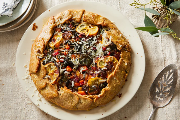 Meyer lemon galette with sautéed greens, rainbow carrots & sweet potato mash