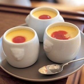 Meyer lemon pots de crème with raspberry sauce