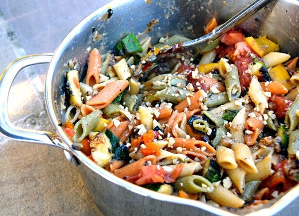 Mezze penne tricolour with roasted summer vegetables and walnuts