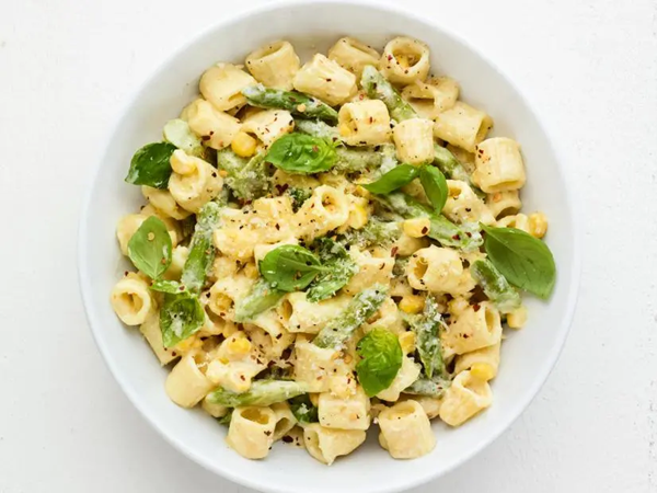 Mezzi rigatoni with asparagus, corn and mascarpone