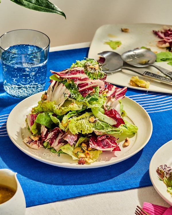 Mile high salad with hazelnuts, Parmesan, and red wine vinaigrette