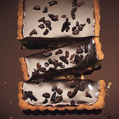 Milk chocolate-caramel tart with hazelnuts and espresso