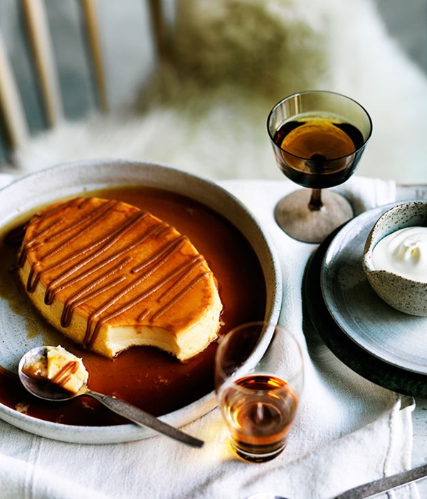 Milk flan with dulce de leche and whipped cream
