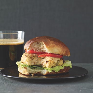 Millet burgers with olives, sun-dried tomatoes, and pecorino