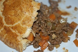 Minced beef pie with cheesy crust