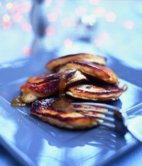 Mincemeat and apple fritters with jaggery rum syrup