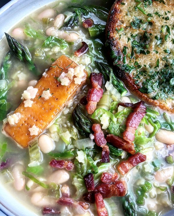 Minestrone soup with Parmigiano Reggiano with garlic and parsley butter toast