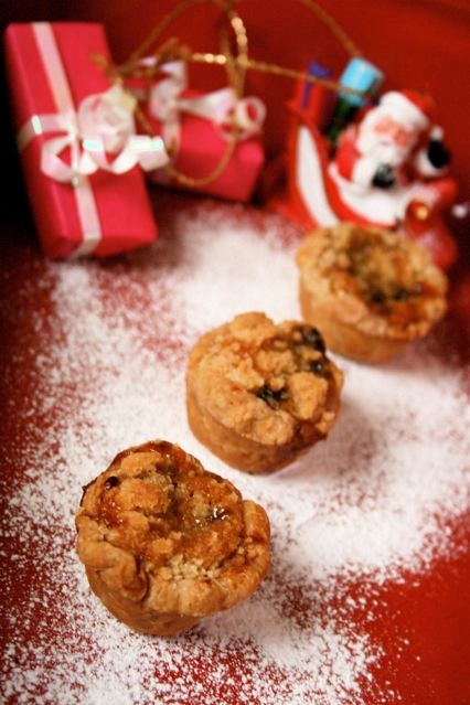 Mini almond crumble topped mince pies with cinnamon pastry