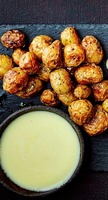 Mini baked spuds with fondue dip
