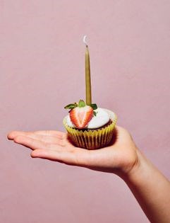 Mini chocolate cupcakes with cream & berries