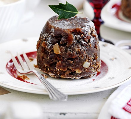 Mini Christmas puddings with clementine custard
