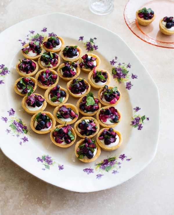 Mini goat's cheese tarts with blueberry salsa