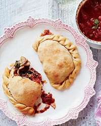 Mini kale-mushroom calzones with smoked mozzarella
