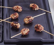 Mini lamb, feta and pomegranate koftas with yogurt tahini sauce