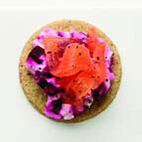 Mini oatcakes topped with beetroot mascarpone and smoked salmon