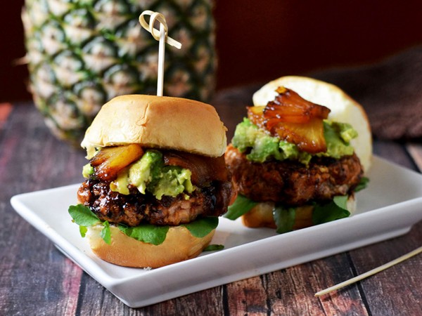 Mini pineapple-teriyaki-glazed salmon burgers with avocado