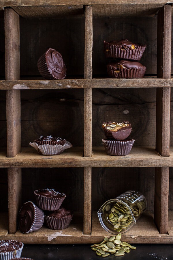 Mini pumpkin seed candy chocolate peanut butter cups