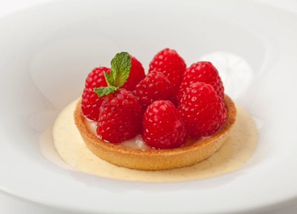 Mini raspberry and almond tartlets with custard