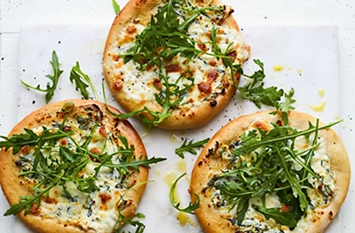 Mini rocket & ricotta pizzas