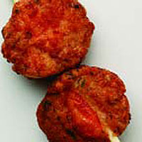 Mini Thai fishcakes on lemon grass skewers