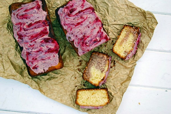 Mini white chocolate and raspberry jam marble loaf cakes with a white chocolate jam ganache