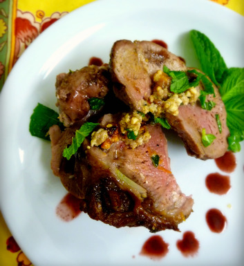 Mint and feta stuffed leg of lamb with balsamic blood orange sauce