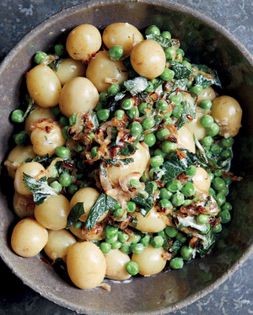 Minted baby potatoes, peas and crème fraîche