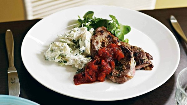 Minute lamb steaks with roasted tomato sauce and potato salad