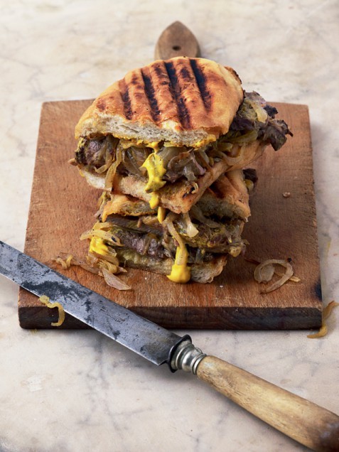 Minute steak sandwich with fried onions and sweet mustard