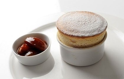Mirabelle soufflé with poached plums