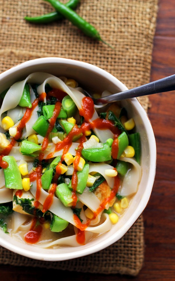Miso noodle soup with corn, kale, and snap peas