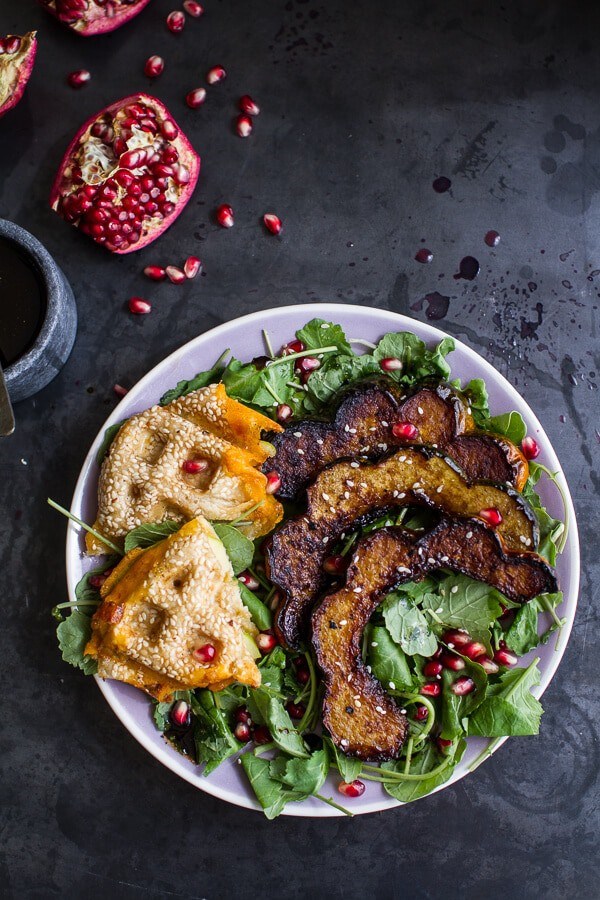 Miso roasted acorn squash + pomegranate salad w/waffled cheddar apple + tahini grilled cheese triangles
