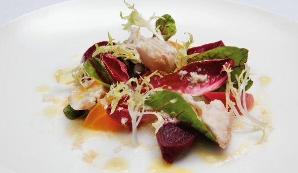 Mixed beetroot salad with smoked mackerel and horseradish dressing
